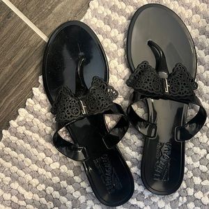 Black authentic jelly Ferragamo sandals